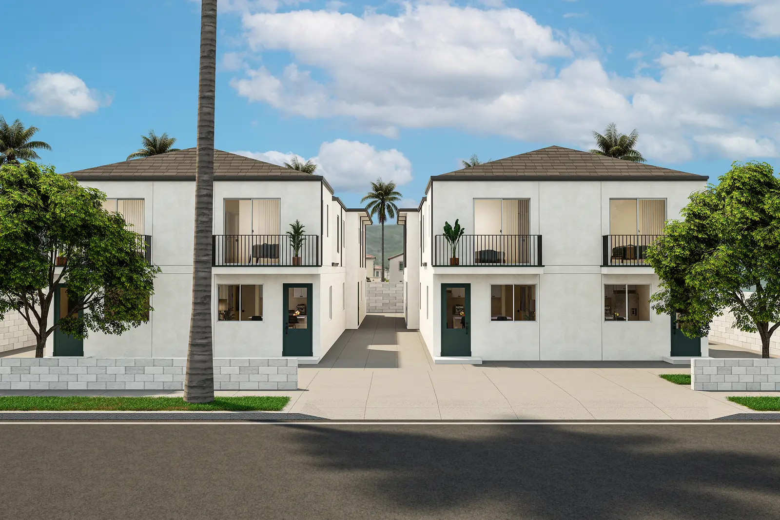 Modern duplex buildings with balconies and palm trees in the background.
