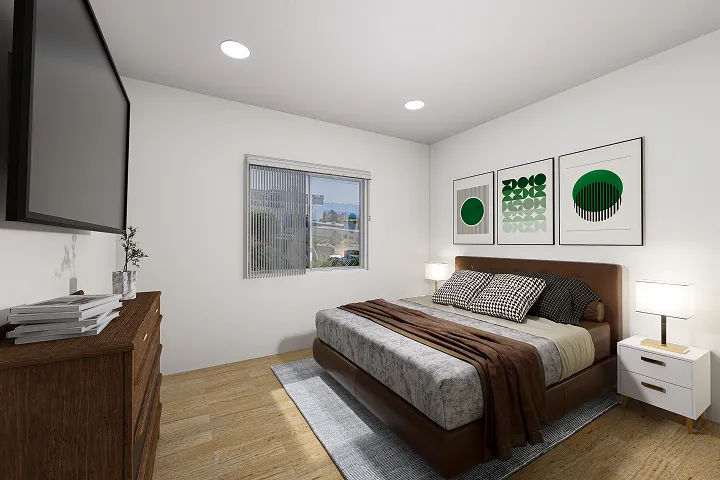 Cozy bedroom with modern decor and green-themed wall art.