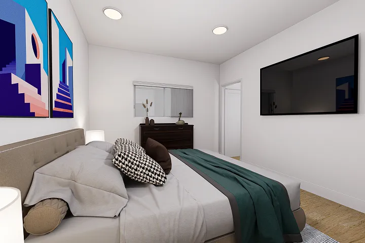Modern bedroom with colorful artwork, dark dresser, and wall-mounted TV.